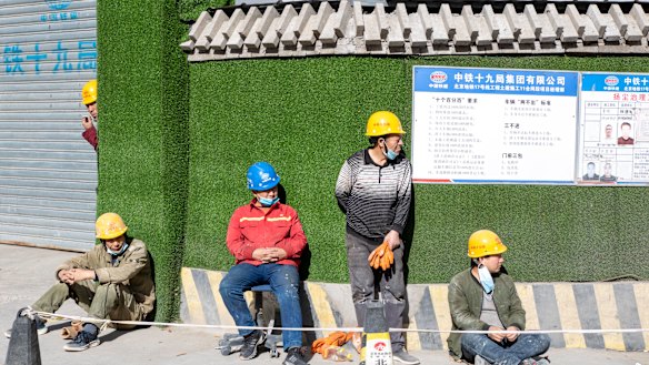 A China Railway Construction worker says Trump has a good business mind. 