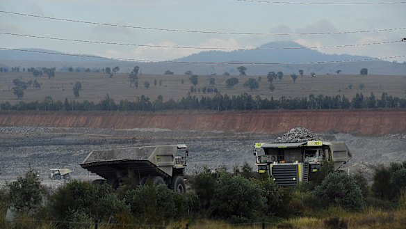 Heavy machinery working at the BHP Mt Arthur mine near Muswellbrook, NSW.