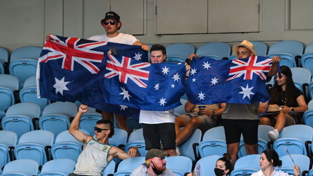Matt Gaskett , Ethan Curwood, and Zach Panaia with their Aussie flags.
