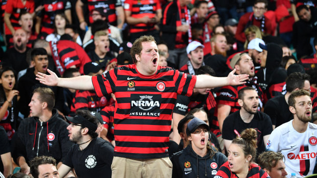 Wandering: Western Sydney fans walked out after the club's poor first-half performance.