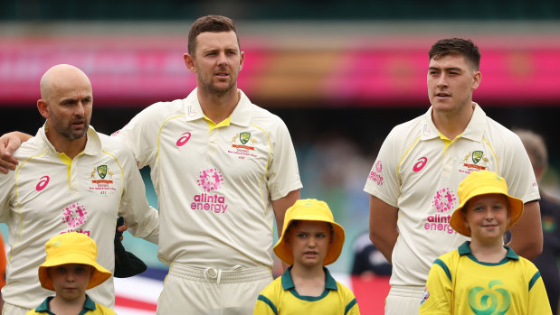 Matt Renshaw (right) during the national anthems. 