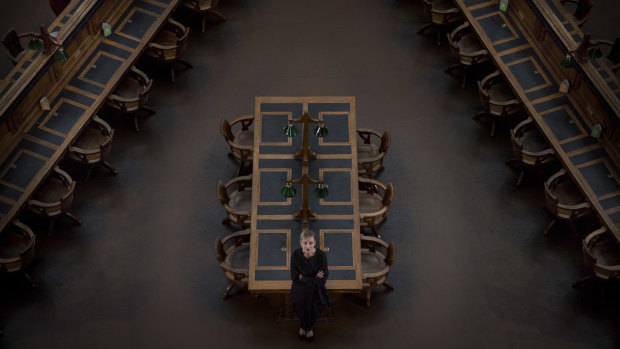 Kate Torney in the empty reading room. The library will reopen "as soon as we possibly can".