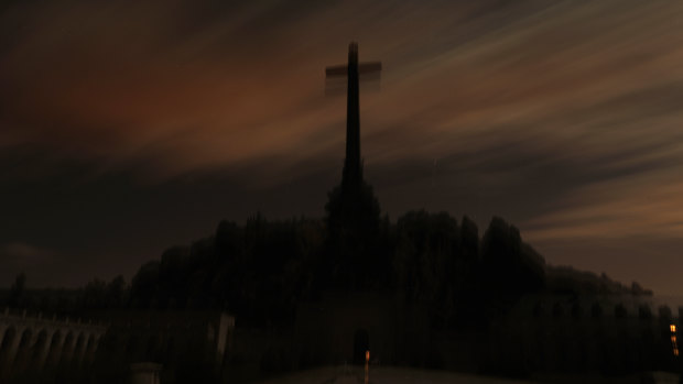 Guardia Civil officers stand guard in front of The Valley of the Fallen mausoleum near El Escorial, outskirts of Madrid.