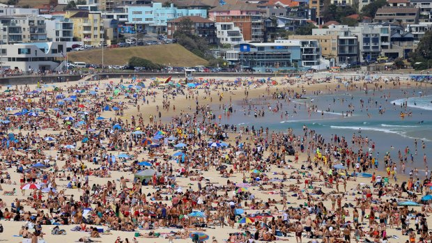 Crowds of people at Bondi beach on Christmas Day.