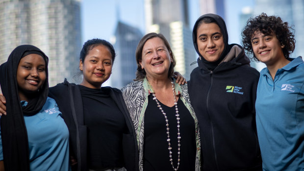 Lisa Wilson (centre) with students (from left) Hamda, 16, Iang, 20, Khursand, 18, and Haidi, 18.