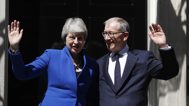 Britain's now former prime minister Theresa May and her husband Philip outside 10 Downing Street.