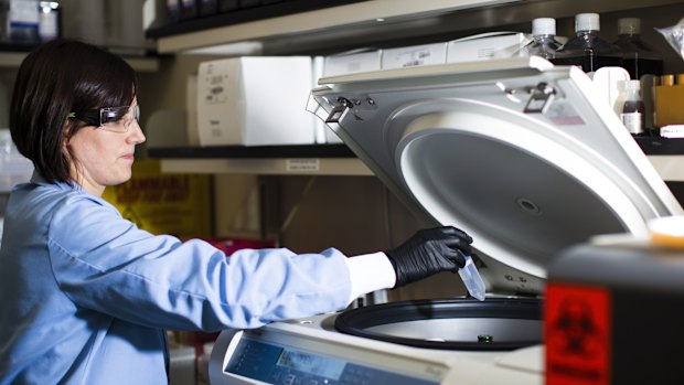 A research associate works at the Moderna Therapeutics Inc. lab in Cambridge, Massachusetts, US, which has had positive results for a vaccine.