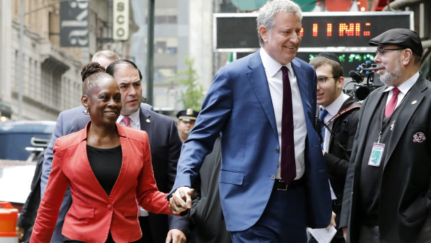 De Blasio and his wife Chirlane McCray arrive at "Good Morning America" on Thursday.