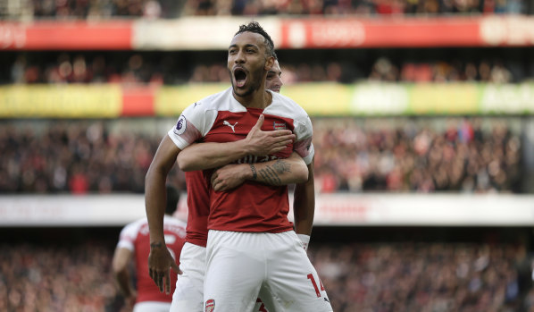 Arsenal's Pierre-Emerick Aubameyang celebrates after scoring the opening goal from the spot against London rivals Tottenham at the Emirates Stadium on Sunday.