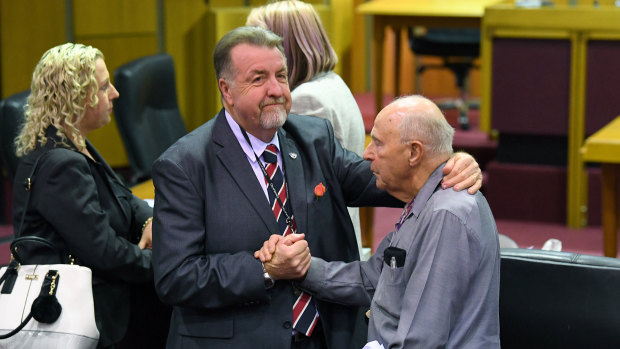 Cr Paul Tully (left) after the Ipswich City Council's final meeting at on Monday.