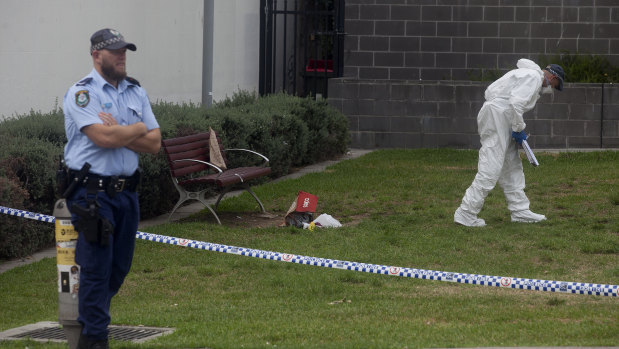 NSW Forensic Services investigating at a crime scene where a man was killed in January 2018 near  Hurstville Train Station.