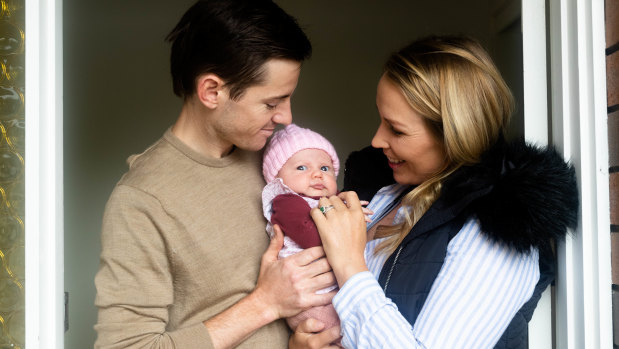 Gytrash’s jockey Jason Collett and partner Clare Cunningham with baby daughter Scarlet Nini, named after the Australian Turf Club’s former social media manager Nini Conallin.