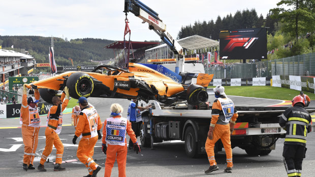 Crew take the car off the track at Spa.