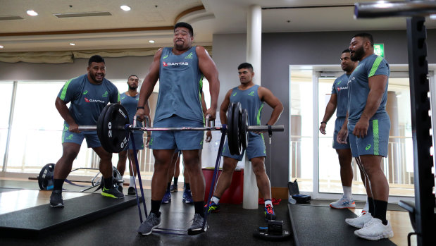 Folau Faingaa, centre, and Tolu Latu, right, are fighting for a starting spot - and pushing each other all the way.