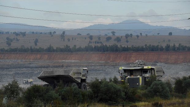 Heavy machinery working at the BHP Mt Arthur mine near Muswellbrook, NSW.