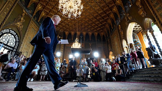 President-elect Donald Trump arrives at a press conference at Mar-a-Lago.