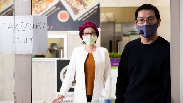 Anthony Dinh with his mother, Kim Thanh, in their restaurant, Banh Cuon in Bankstown.