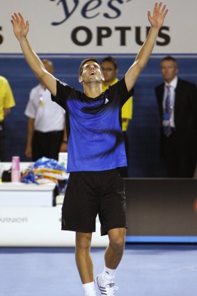 Djokovic celebrates after beating Jo-Wilfried Tsonga in the Australian Open final in 2008.