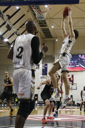 Josh Giddey soars for a dunk during the NBL Cup in March.