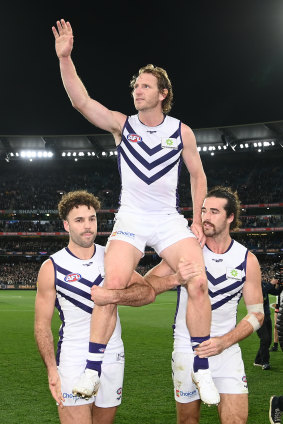 David Mundy is chaired off in his final game. 