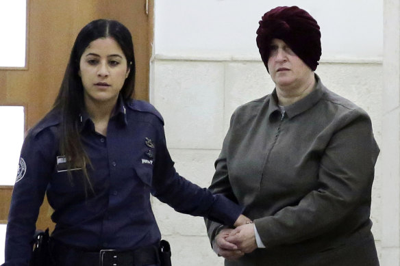 Australian Malka Leifer, right, is brought to a courtroom in Jerusalem  in 2018.