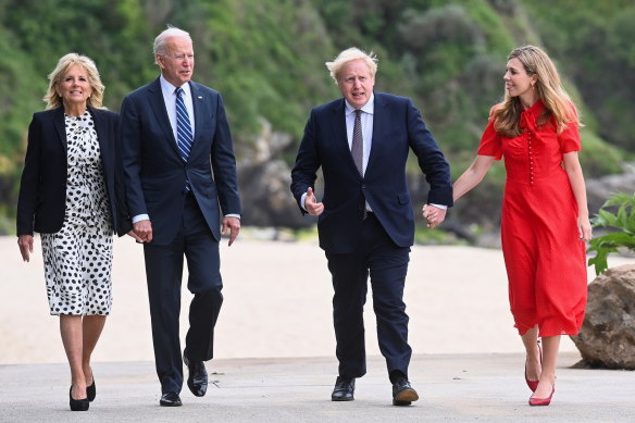 US President Joe Biden and first lady Jill Biden walk by the beach in Cornwall with British Prime Minister Boris Johnson and his wife Carrie Johnson, ahead of the G7 Summit.