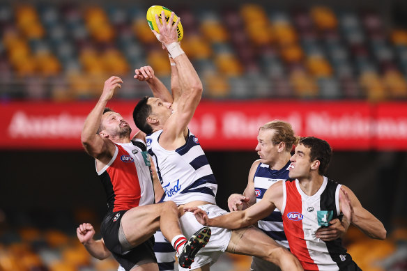 Harry Taylor takes a mark. 