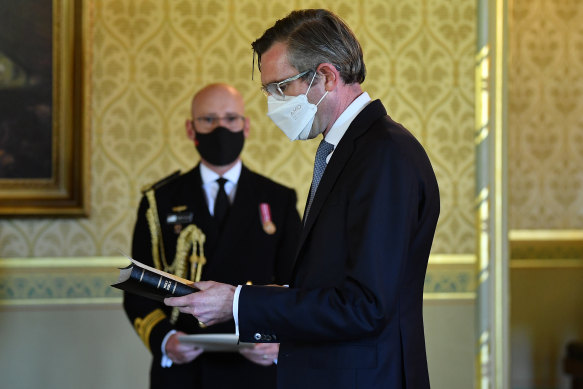 Dominic Perrottet being sworn in as the state’s new Premier.