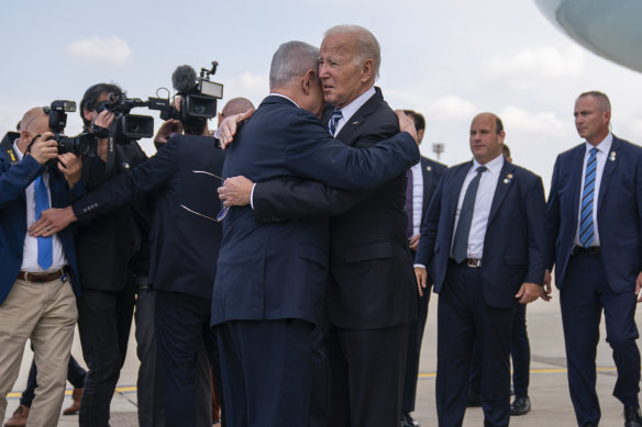 Joe Biden and Benjamin Netanyahu embrace on October 18.