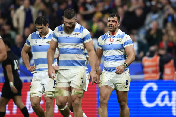 Argentina’s players react during the Rugby World Cup semifinal match between Argentina and New Zealand 