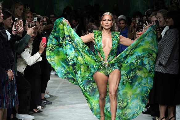 Still iconic ... J-Lo closes Versace's Milan Fashion Week show in an update of her 2000 Grammys dress.