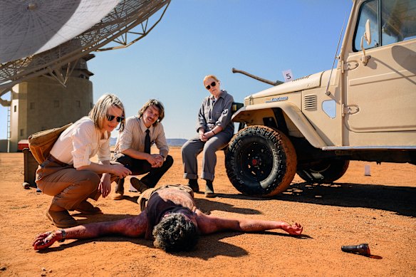 Mia Wasikowska and Xavier Samuel, with Di Adams and Sam Parsonson (lying on ground) in The Killings at Parrish Station.