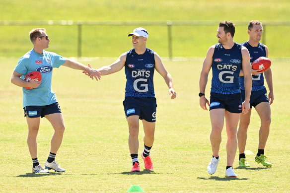 Back in the fold: Gary Ablett greets Geelong assistant coach Matthew Knights. 