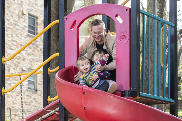 Renn Holland with daughter Lourdes and son Enzo in a park near their Sydney home.