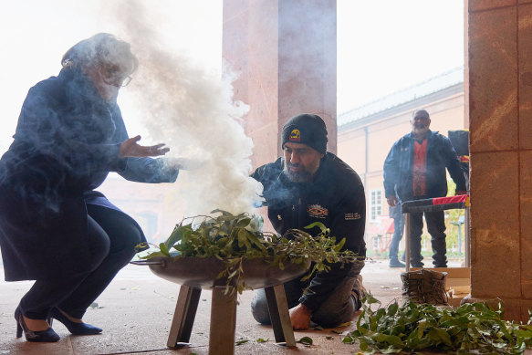 A traditional smoking ceremony, which has cleansing properties and the ability to ward off bad spirits from the people and the land and make pathway for a brighter future, is performed in Leipzig. 

