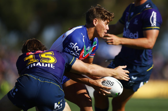 Reece Walsh is tackled by Alec McDonald during the trial between the Melbourne Storm and the New Zealand Warriors at Casey Fields.