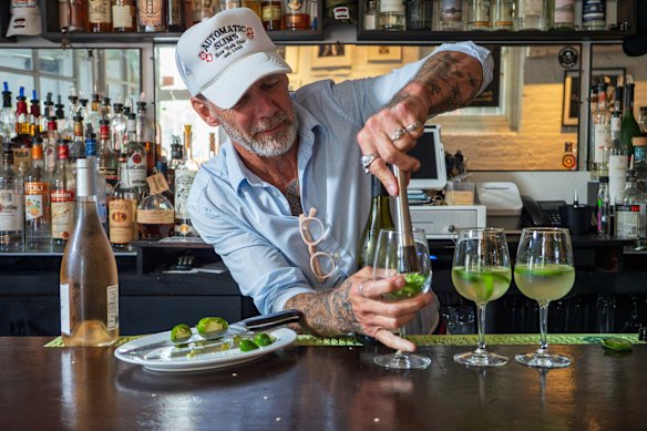 Bartender John Murphy mixes sauvignon blanc with jalapenos at his bar, Automatic Slim’s, in New York City.