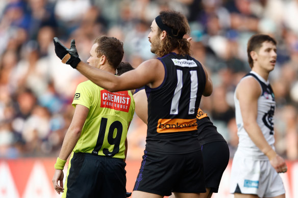 James Aish of the Dockers gestures during the controversial finish.