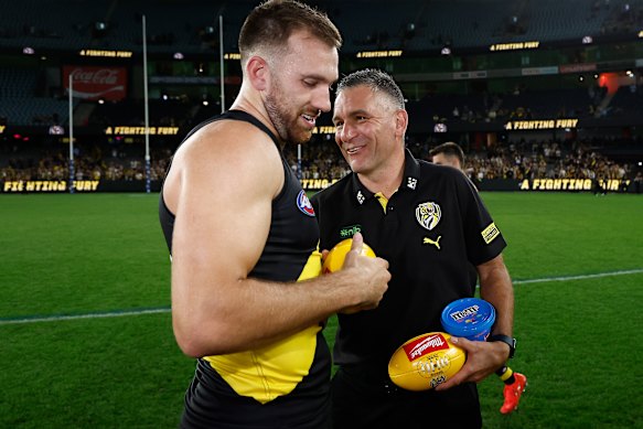 Adem Yze congratulates Balta after their side’s win.
