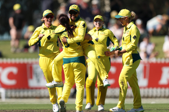 Megan Schutt of Australia celebrates after taking the wicket of Lauren Bell of England and winning the game