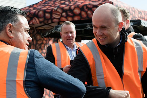Mark Connell  (centre) behind John Barilaro and then-NSW environment minister Matt Kean in June 2020.