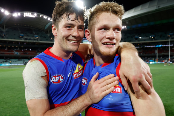 Josh Dunkley and Adam Treloar celebrate their preliminary final win over Port Adelaide.