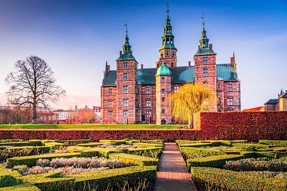 Rosenborg Slot is a 17th-century castle in Copenhagen, known for its gardens.