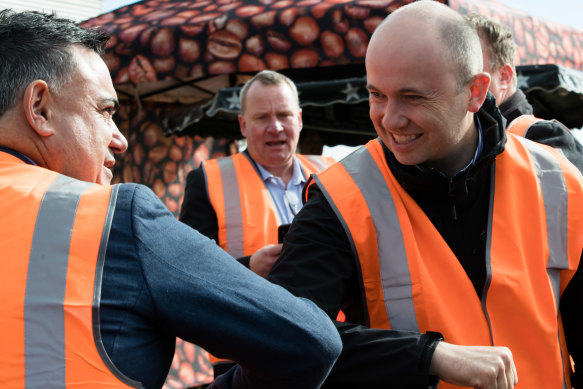 Mark Connell  (centre) behind John Barilaro and then-NSW environment minister Matt Kean in June 2020.