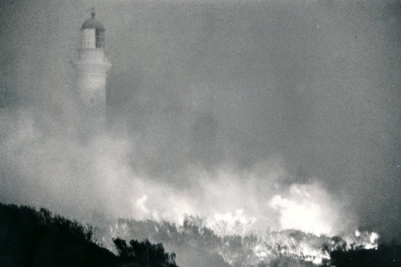 Besieged by flames: but the Airey’s Inlet lighthouse survived.