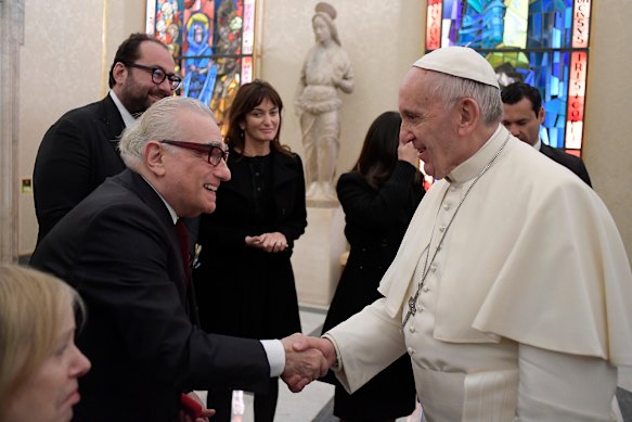 Pope Francis shakes hands with director Martin Scorsese on the occasion of their private audience at the Vatican in 2016.  