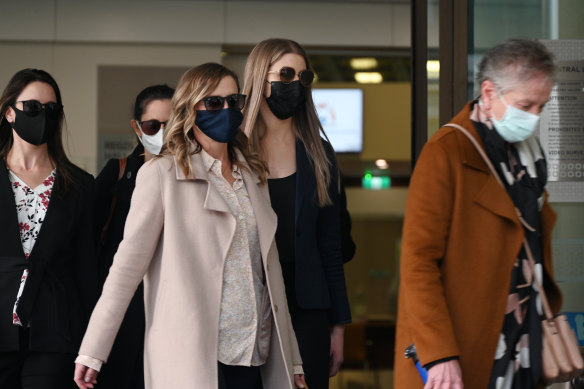 Perth Children’s Hospital nurse Cathryn Davies, centre, and her colleagues after giving evidence at the coro<em></em>nial inquest into the death of Aishwarya Aswath.