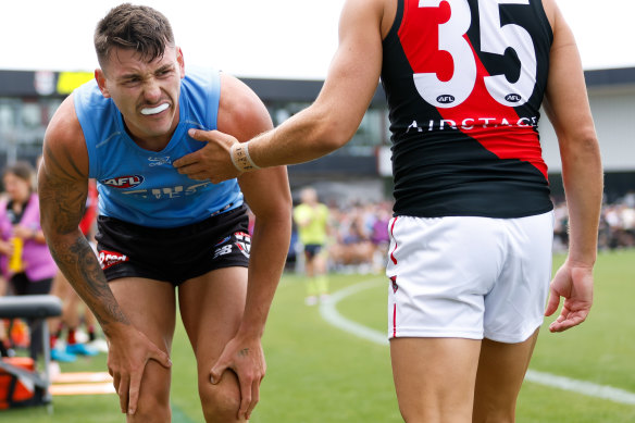 Josh Battle shows his discomfort on the sidelines.