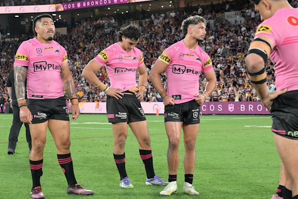 The Panthers upon realising their dream of a fifth-straight title was over.