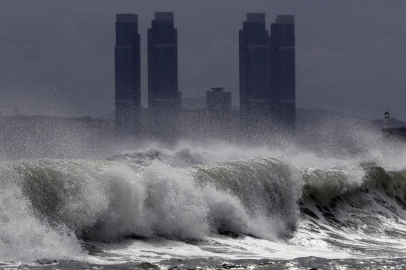 High waves whipped up by typhoon Bavi crash onto Haeundae Beach in Busan, South Korea, on Wednesday.